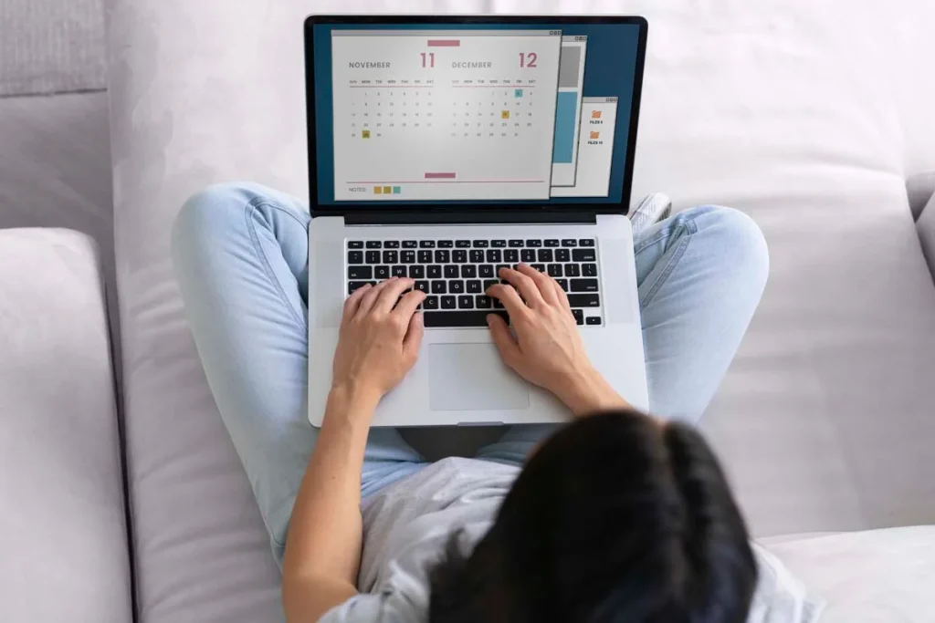 A person scheduling a convenient appointment date on a calendar for residential cleaning services