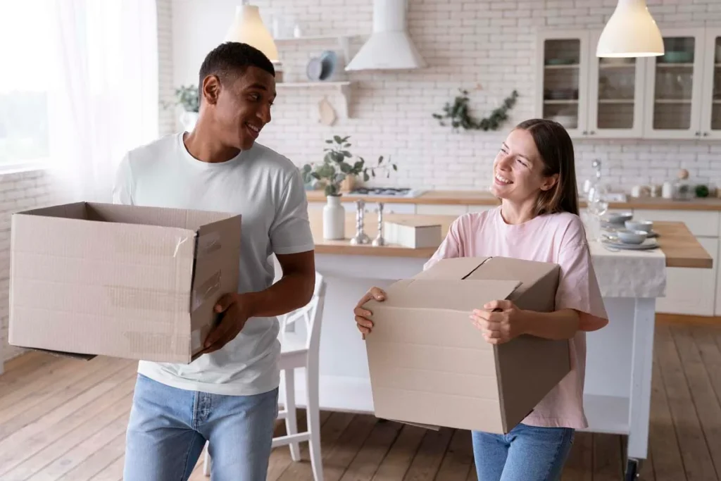 Homeowners moving into a clean home after professional move-in cleaning